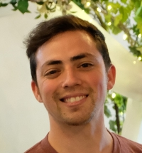 A photo of Andrew Larson smiling, taken by his grandmother